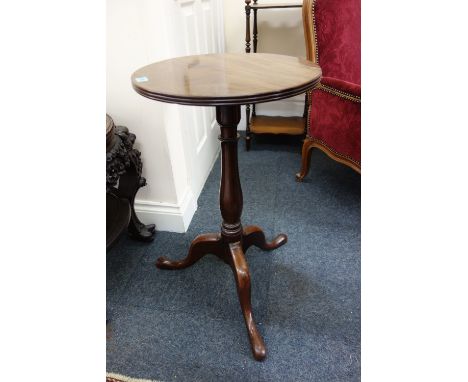 A George III mahogany pedestal table, the circular moulded edge top on a baluster turned pillar and tripod base, 42.5cm diame