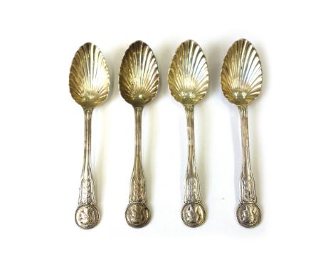 A set of four William IV cast silver fruit spoons, William Traies, London 1836, the stems with classical portrait bust rounde