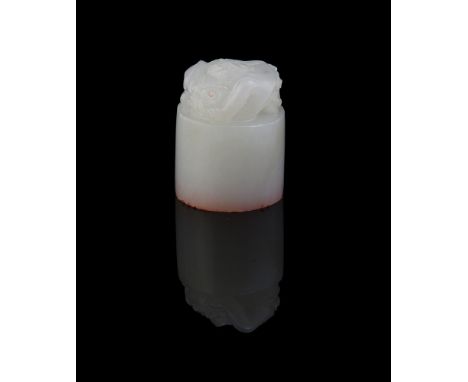 A Chinese white jade cylindrical seal, the top craved with a chilong, 3.5cm high白玉螭龙钮印Condition Report: in good condition Con