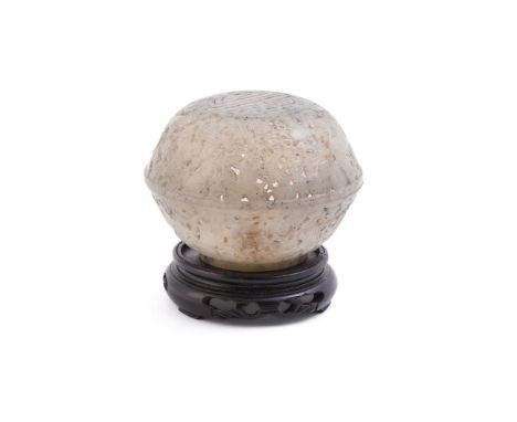 A Chinese pale celadon and grey jade pierced 'Shou' box and cover, 19th century, carved openwork with gourds and vines, the b