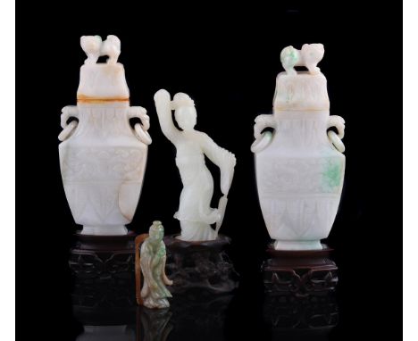 A pair of Chinese Jadeite archaistic vases and covers, Republican Period, each vase has loose ring handles and is carved with