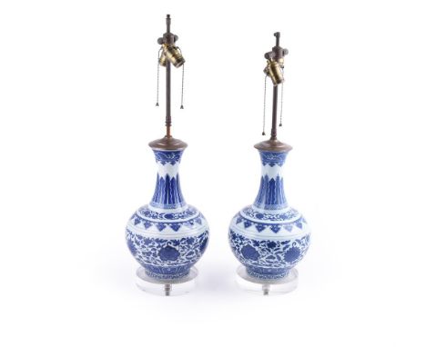 A pair of Chinese blue and white bottle vases, underglaze blue Guangxu-six character marks, the bulbous bodies painted in the