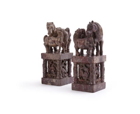 An attractive large pair of Chinese 'Horse' soapstone 'seal' carvings, late 19th century or early Republic, uncut bases, 27cm