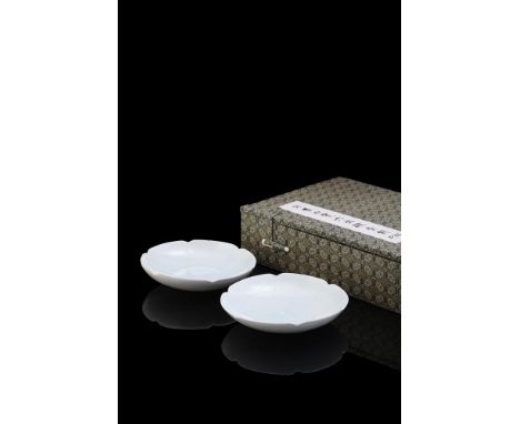 A pair of small Chinese qingbai foliate dishes, Northern Song Dynasty (960-1127), thinly potted with gently rounded sides ris