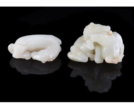 A Chinese small white jade model of a recumbent 'horse', Qing Dynasty, approximately 5cm long x 2.8cm wide x 2.2cm deep and a