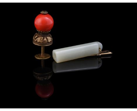 A Chinese gilt-metal mounted red glass hat finial and a celadon jade plume holder, Qing Dynasty, the finial overall approxima