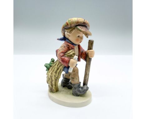 Hand-painted figurine depicting a boy with a walking stick and grasshopper. Goebel backstamp on the bottom. Issued: 1971Dimen