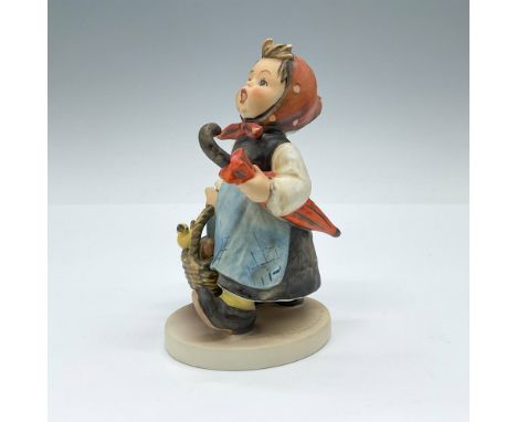 Porcelain figurine depicting your girl with a picnic basket going to visit someone. Goebel TMK5. Issued: 1972-1979Dimensions: