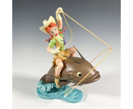 Slue Foot Sue, a cowgirl from the 1948 film Melody Time, is known for wrangling giant catfish. This sculpture depicts Sue rid