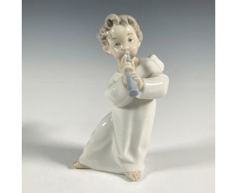 A glossy figure of a young angel playing a blue flute. Lladro backstamp. This item has its original box: 8.25"L x 6"W x 6.25"
