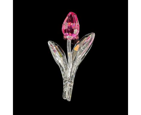Faceted crystal figure of a tulip with a clear stem and pink flower top. Swarovski mark. Item number 7400NR200407. This item 