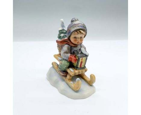 Hand-painted figurine depicting a boy sledding in the snow. Goebel backstamp on the bottom. Dimensions: 4"L X 2.5"W x 4.5"HMa