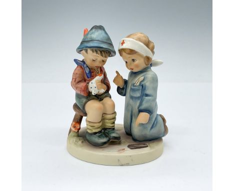 Figurine of a young doctor making a house call to an injured friend. Matte finish collectable on round base. Goebel TMK6 #376