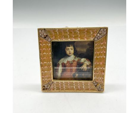 Gilt square enameled frame with pink and cream wavey design. Corners of frame are adorned with Swarovski crystals. Jay Strong