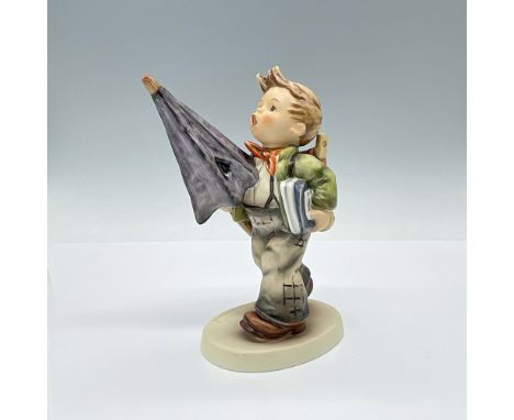 Hand painted figurine depicting schoolboy with umbrella. Goebel TMK6. Issued: 1979-1990Dimensions: 4.5"L x 3"W x 6"HManufactu