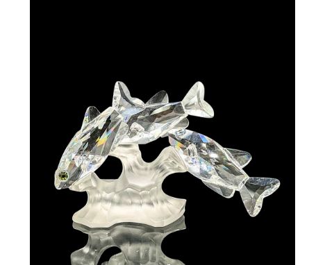 Clear faceted crystal figure of a butterfly resting on a frosted crystal leaf. Swarovski mark. Item number 7615NR000003. Part
