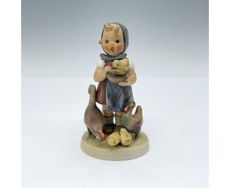 Matte hand-painted porcelain figurine featuring a young girl feeding a chicken family. Goebel TMK4. Issued: 1972-1979Dimensio