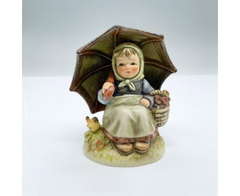 Hand-painted figurine depicting a girl holding an umbrella and flower basket with a small bird beside her. Goebel backstamp o