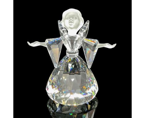 Clear faceted crystal figural with satin crystal face and hands. Swarovski backstamp. 7475 000 060. This item has its origina