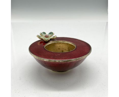 Hand cast and enameled this colorful holder has rust colored enamel over metal with floral accent in emerald, green petals an