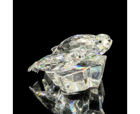 Dazzling clear faceted crystal figure of a mother and baby seal with black eyes and nose on an iceberg. Swarovski mark. The S