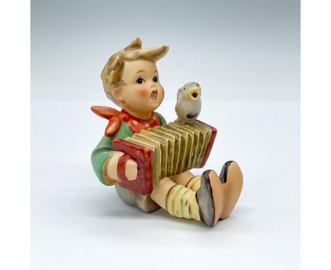 Hand painted porcelain boy with accordion, matte finish. Goebel TMK6. Artist: Reinhold UngerIssued: 1979-1990Dimensions: 3.5"