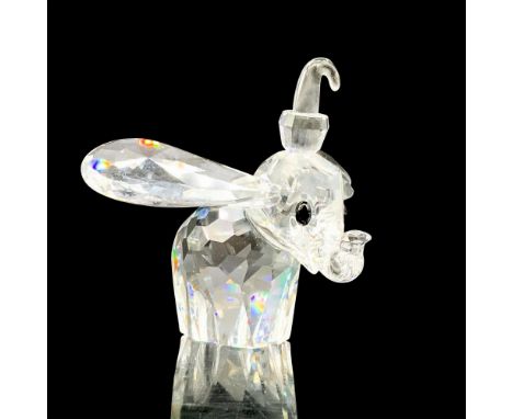 A clear crystal figure of Dumbo with his ears and trunk raised a bit. Black crystals are used for the eyes. Swarovski backsta