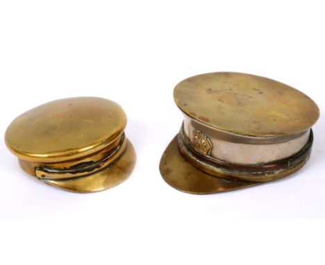 GREAT WAR - A SMALL BRASS TRENCH ART SNUFF BOX IN THE FORM OF A PEAKED CAP  with hat-band, and hinged base for snuff, 5cm lon