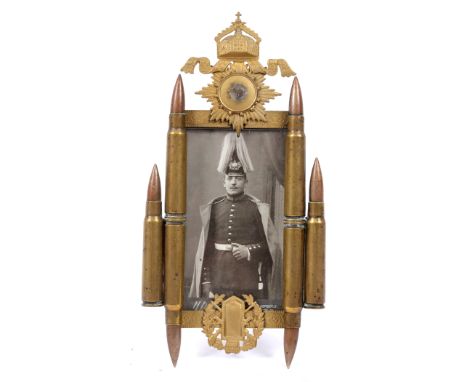 GREAT WAR - AN IMPERIAL GERMAN TRENCH ART STYLE PHOTOGRAPH FRAME  surmounted with a Prussian Imperial crown device flanked wi