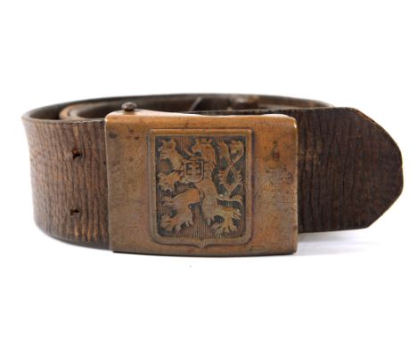 SECOND WORLD WAR - A CZECHOSLOVAKIAN ARMY BRASS BUCKLE  on its original brown leather belt 