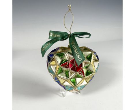 Handcrafted ornament with a stained glass design that forms a beautiful heart, featuring a geometric pattern with vibrant col