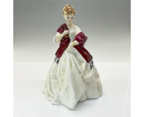 This beautiful hand painted fine bone china figurine is modeled in a white dress with deep red shawl. Royal Albert backstamp.