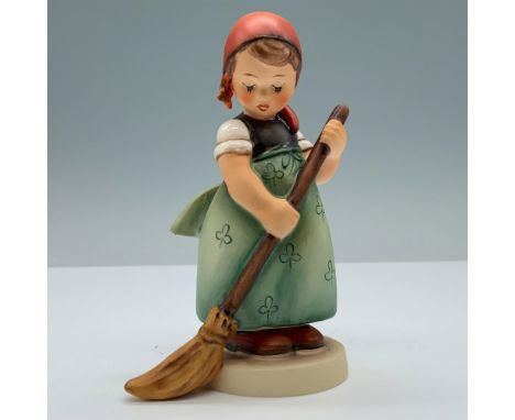 Hand painted porcelain in matte finish modeled as a young girl sweeping. M. I. Hummel impressed backstamp. Goebel backstamp. 