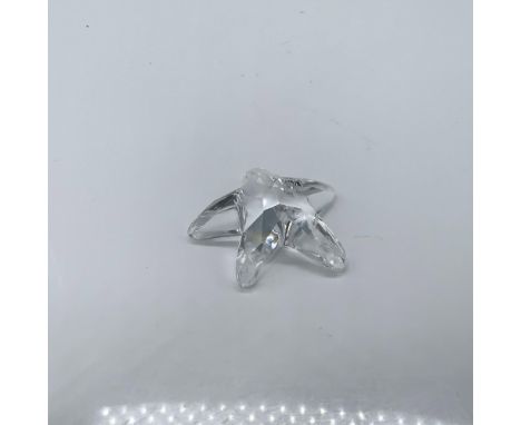 Lead clear crystal starfish given to members renewing their membership in 2005. Swarovski swan mark. This item has its origin