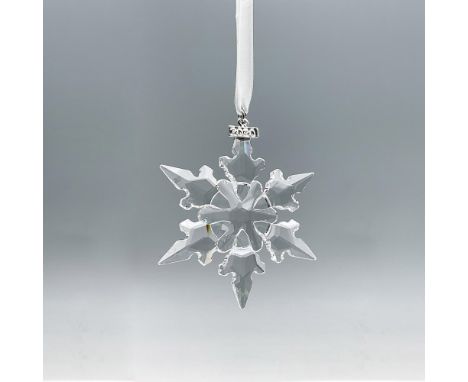 Gorgeous limited edition clear crystal ornament, featuring a classic six pointed sparkling snowflake, crafted with an intrica