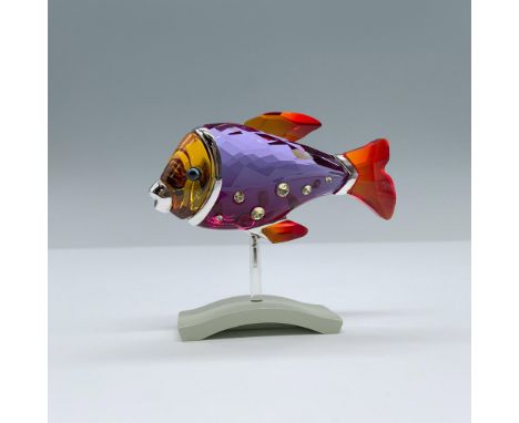 Brilliant multicolored crystal figural in amber, red, purple with yellow crystals along the side. Rhodium mouth and rings aro