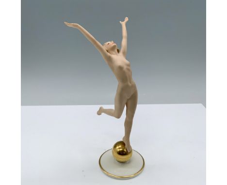 Hand painted porcelain Art Deco figurine in a sun child position, commemorating the 1937 Olympics. The main body is decorated