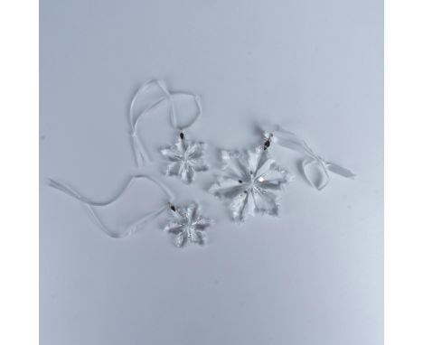Stunning clear crystal ornament. Boasts a detailed faceted design, enhancing its light reflecting properties. Includes the or