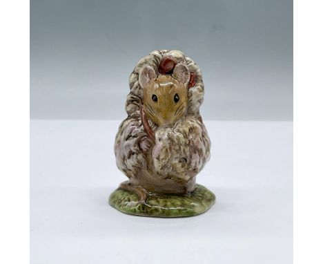 Glossy porcelain. Features a mouse wearing a coat and a bow on her head. Beswick, F Warn &amp; Co. Beatrix Potter copyright b