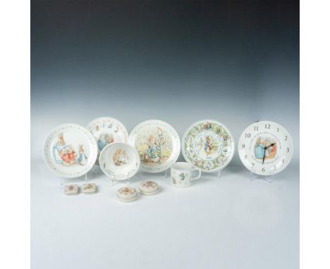 Cheerful group of decorative Bunnykins items. Wedgewood bone china tableware and clock, stamped Wedgewood. Four luncheon plat