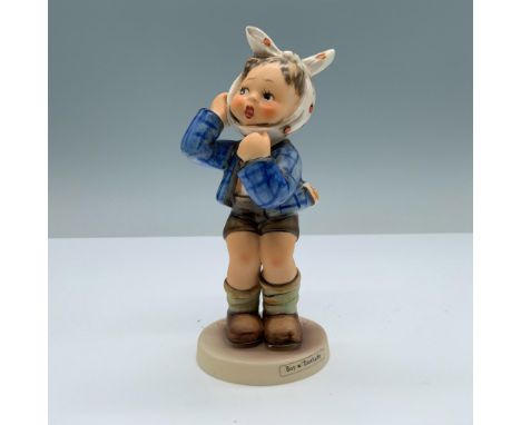 Hand painted porcelain with matte finish features a distressed boy who is wearing a plaid blue jacket and a polka-dotted scar