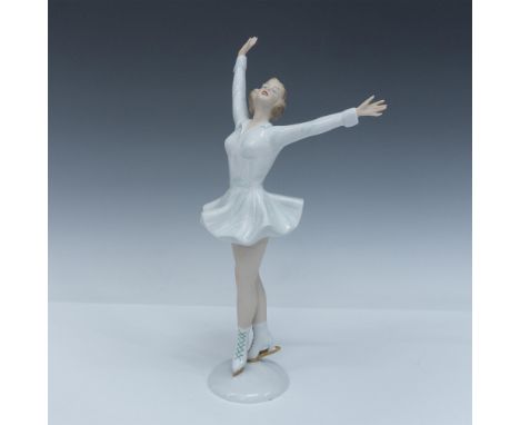 Beautiful glazed and matte porcelain figure of a lady ice skating with gold accented ice skates. Marked Wallendorf. Issued: 2