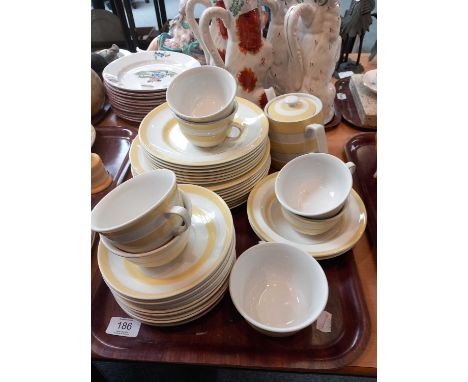 T G Green Cornish Ware, yellow banded part breakfast set, comprising: teapot, 6 cups, 13 saucers, 2 bowls, 9 plates, 7 side p