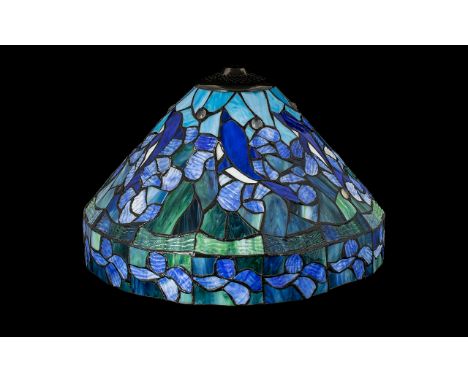 A Large And Impressive Reproduction Tiffany Lamp Shade Leaded and glazed shade of canopy form; the whole profusely decorated 