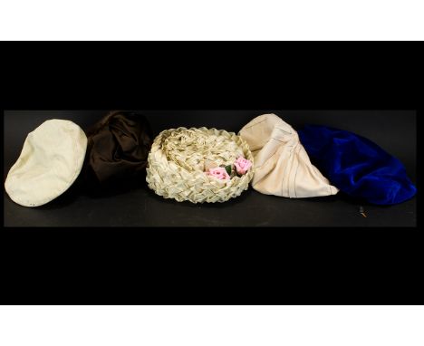 A Collection Of Vintage Hats Five items in total to include woven raffia and grosgrain trim boater style hat by Marshall &amp