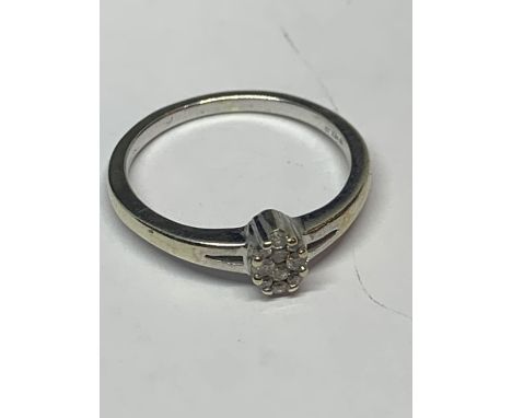 A 9 CARAT GOLD DIAMOND RING SIZE L IN A PRESENTATION BOX 