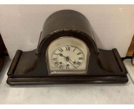 A NAPOLEON HAT MANTLE CLOCK WITH A WESTMINSER CHIME 