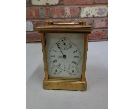 A VINTAGE CARRIAGE CLOCK WITH DECORATIVE SIDE PANELS DEPICTING LADY AND GENTLEMAN 