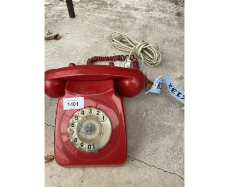 A RETRO RED ROTARY DIAL TELEPHONE 