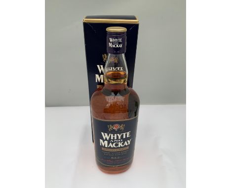 A BOXED 1 LITRE WHYTE AND MACKAY BLENDERS STRENGTH SMOOTH SCOTCH WHISKY DOUBLE MATURED BOTTLED AT 52.5% VOLUME 